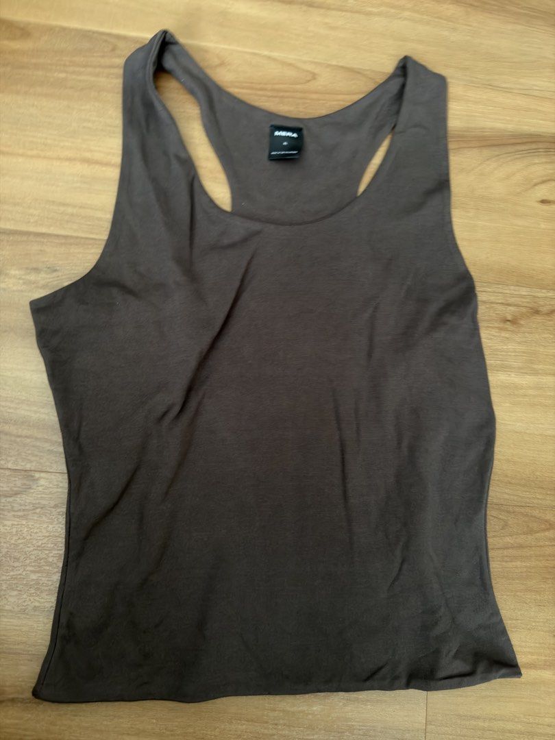 MERA Racerback Tank Top (Category: Sleeveless) located in Quezon City. Submitted by bschu (Listing ID 1462939895, Image 2). Description: - Brand: MBRA - Style: Racerback Tank Top - Color: Grey - Material: Soft fabric - Fit: Comfortable - Occasion: Workout or casual wear - Features: Simple and versatile.