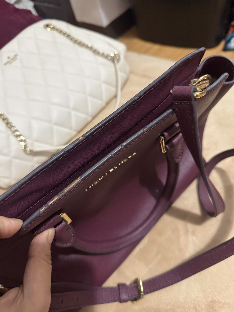 Michael Kors Bag (Category: Cross-body Bags) located in Cebu City. Submitted by sultrychicmary (Listing ID 1463101670, Image 2). Description: see condition on the photos posted what you see is whag you get.