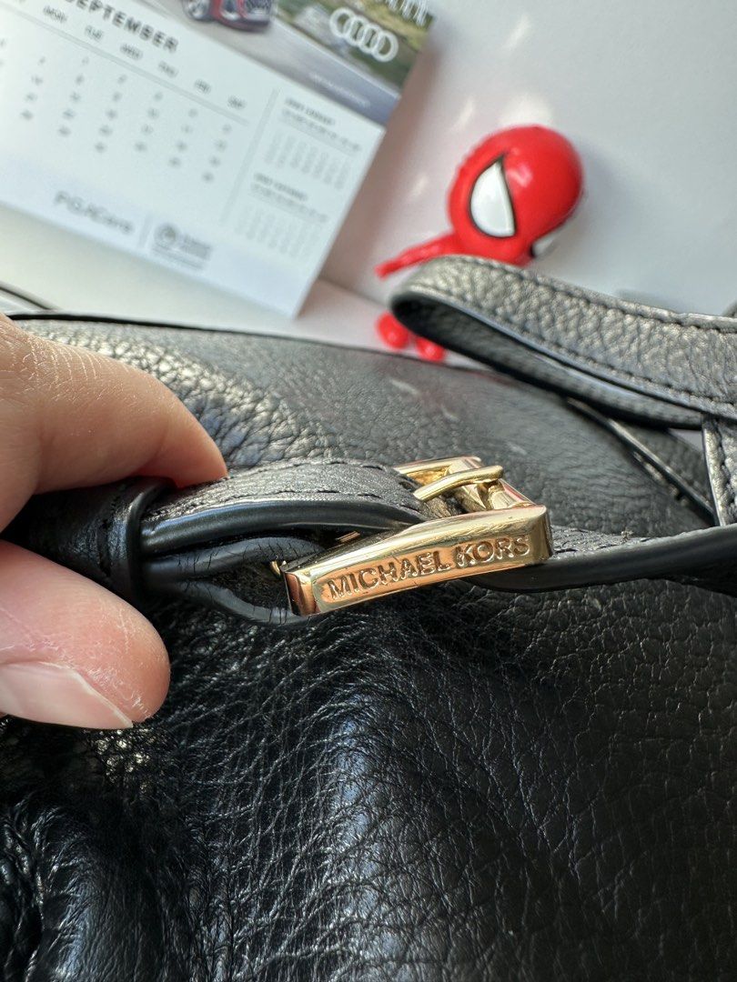 Michael Kors Black Leather Backpack Gold Hardware (Category: Backpacks) located in Pasig City. Submitted by staceylouieyu (Listing ID 1462908001, Image 3). Description: - Authentic Michael Kors black leather backpack - Elegant gold hardware on zippers and buckles - Ample interior space for essentials - Perfect for everyday use or travel - Inclusion: dustbag.
