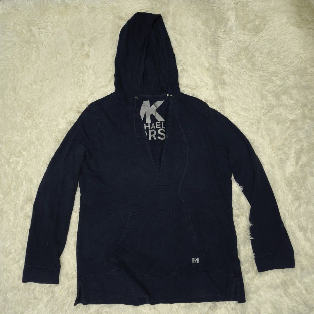 Michael Kors Navy Blue Hoodie (Category: Coats, Jackets and Outerwear) located in Antipolo. Submitted by alphaomega_fox (Listing ID 1462897291, Image 1). Description: - Navy blue Michael Kors hoodie - Size: XL/XG - Features iconic MK logo on the front - Subtle MK detail on the sleeve - Adjustable drawstring hood - Convenient kangaroo pocket - 23x28.5 250 plus sf.