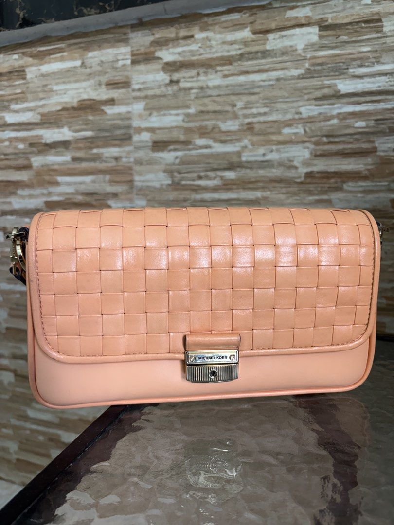 Michael Kors Woven Leather Shoulder Bag - Peach (Category: Shoulder Bags) located in Cavite. Submitted by aiks1993 (Listing ID 1462756218, Image 1). Description: Message for more photos/details.