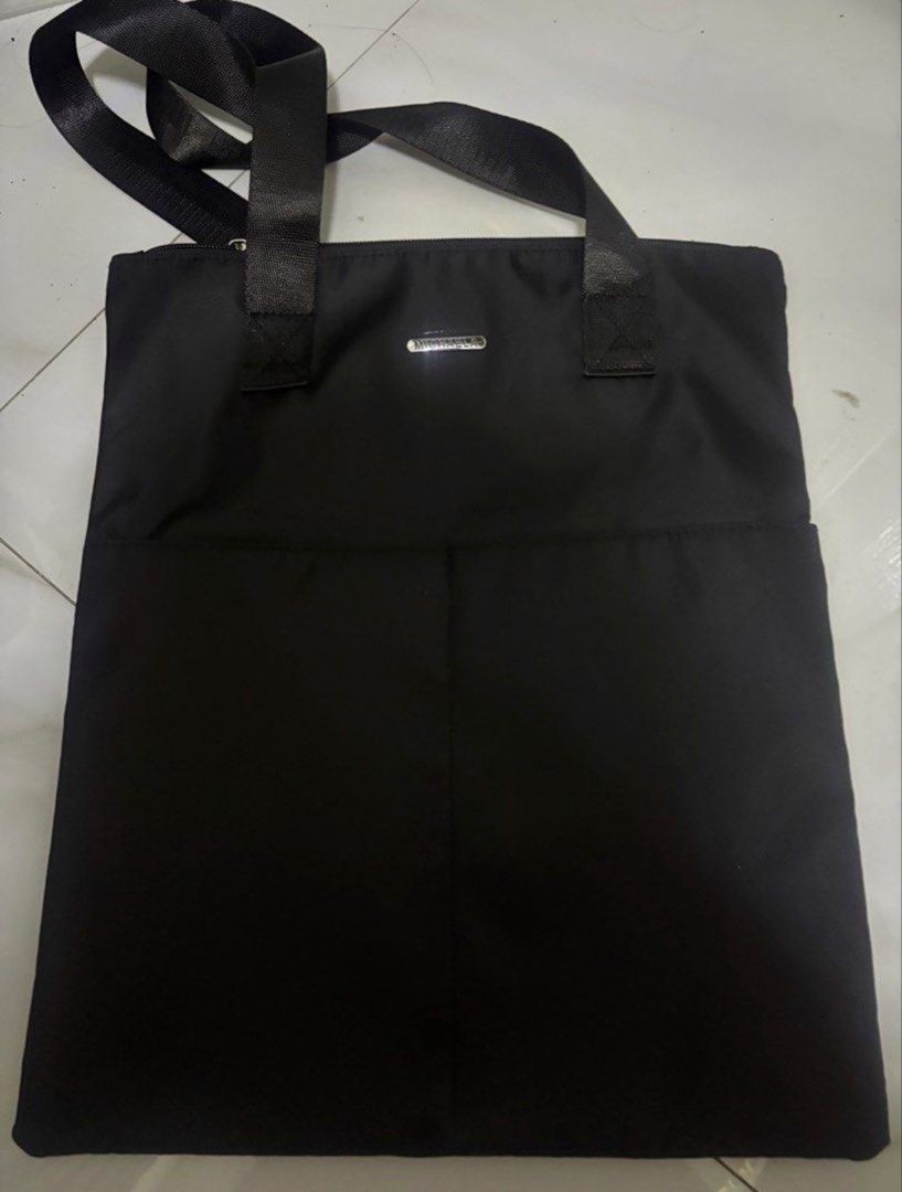 MICHAELA TOTE BAG (Category: Tote Bags) located in Manila. Submitted by alyyy. (Listing ID 1462972893, Image 1). Description: Michaela Tote Bag color: black brand new, never used rfs: mas bet ko pala yung beige color 😅.