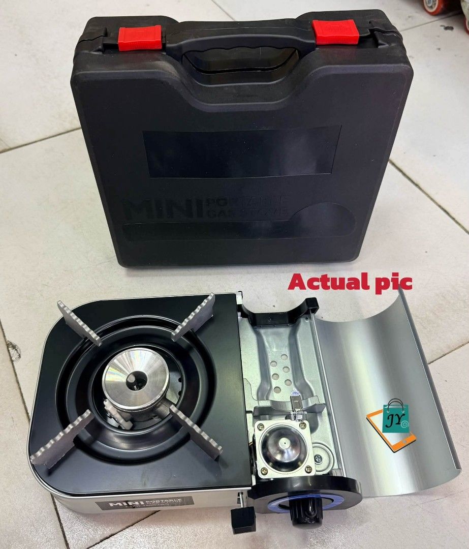 Mini Portable Gas Stove with Carrying Case (Category: Cookers) located in Manila. Submitted by chaionlineshop (Listing ID 1463039042, Image 2). Description: - Compact and portable gas stove - Ideal for camping and outdoor cooking - Comes with a sturdy black carrying case - Simple setup and operation - Features an adjustable heat control knob - Lightweight and convenient for travel.