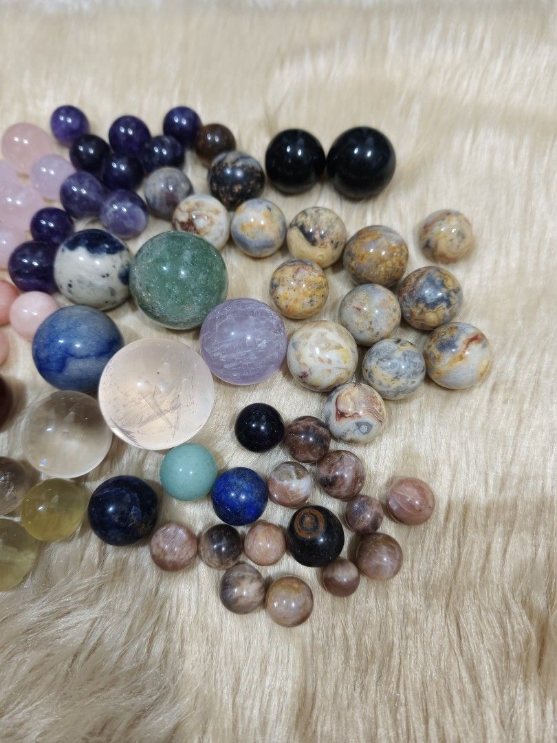 Mini Spheres Take All Bundle Natural Crystals (Category: Precious Stones) located in Quezon City. Submitted by piaoliangcollections.ph (Listing ID 1463089992, Image 2). Description: Different Crystal Mini Spheres Take All bundle Rose Quartz Clear Amethyst Citrine Sodalite Green Aventurine Crazy Lace Agate Red Jasper Carnelian Black Obsidian Lavender Amethyst Sunstone Yellow Tiger Eye.