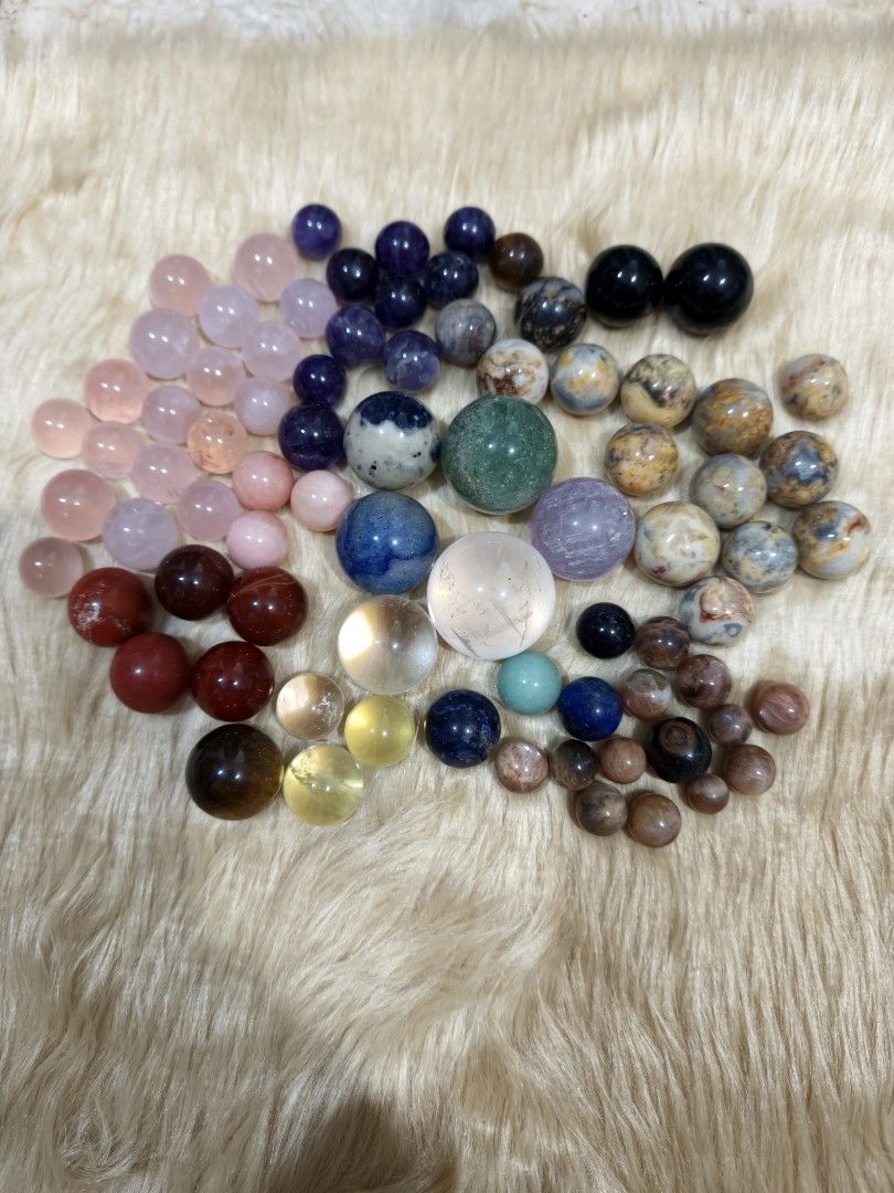 Mini Spheres Take All Bundle Natural Crystals (Category: Precious Stones) located in Quezon City. Submitted by piaoliangcollections.ph (Listing ID 1463089992, Image 1). Description: Different Crystal Mini Spheres Take All bundle Rose Quartz Clear Amethyst Citrine Sodalite Green Aventurine Crazy Lace Agate Red Jasper Carnelian Black Obsidian Lavender Amethyst Sunstone Yellow Tiger Eye.