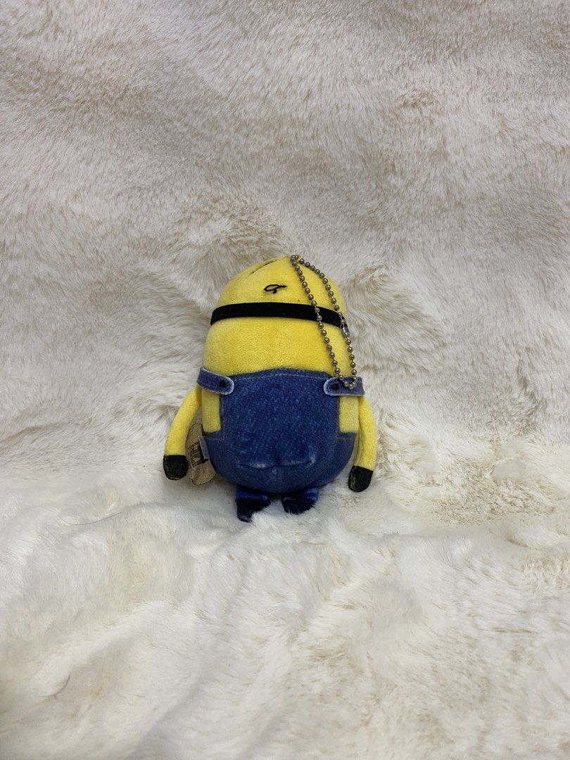 Minion Stuart (Mocchi Mocchi) Plush Charm Keychain (Category: Plushies & Soft Toys) located in Kalibo. Submitted by ollie_stuffshop (Listing ID 1463036059, Image 2). Description: Before you send your inquiries: ❗️Last Price is already posted ❗️Manage your expectations, WYSIWYG ❗️May need washing ❗️Dropoff is every Wednesday & Sunday - Adorable Minion plush toy - Features a convenient keychain attachment - Super soft and cuddly material - Ideal fo