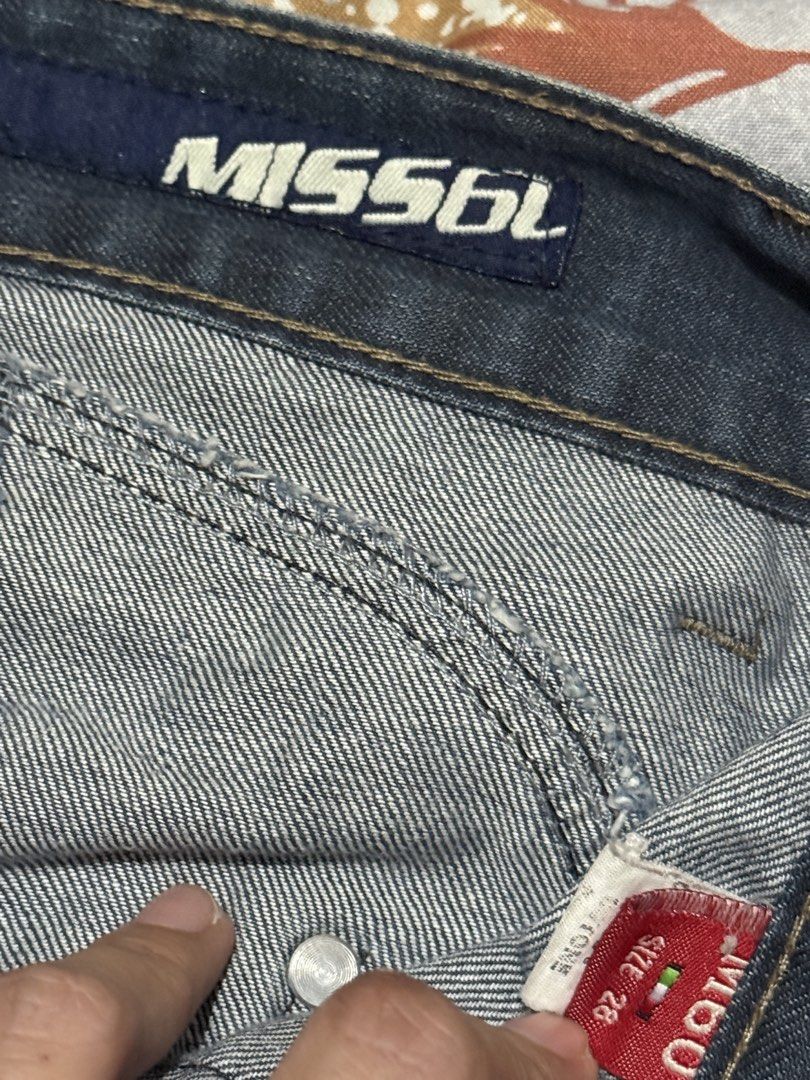 Miss Sixty Blue Denim Jeans Size 28 (Category: Jeans) located in Makati City. Submitted by refind.prelove.finds (Listing ID 1462948939, Image 3). Description: - Brand: Miss Sixty - Color: Blue Denim - Fit: Straight leg with a slightly tapered ankle - Pockets: Unique front pocket details with a zip accent on the left pocket - Back Pockets: Stitching details and logo detail on the right pocket - Size: 28.