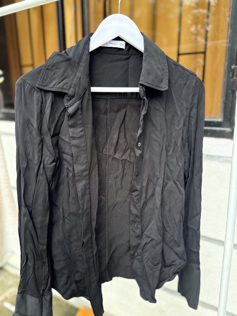 MNG Black Button-Up Shirt (Category: Shirts) located in Manila. Submitted by mcpascua (Listing ID 1462958747, Image 1). Description: - Black MNG shirt - Button-up style with collar - Long sleeves - Relaxed fit - Versatile for casual or smart-casual wear.