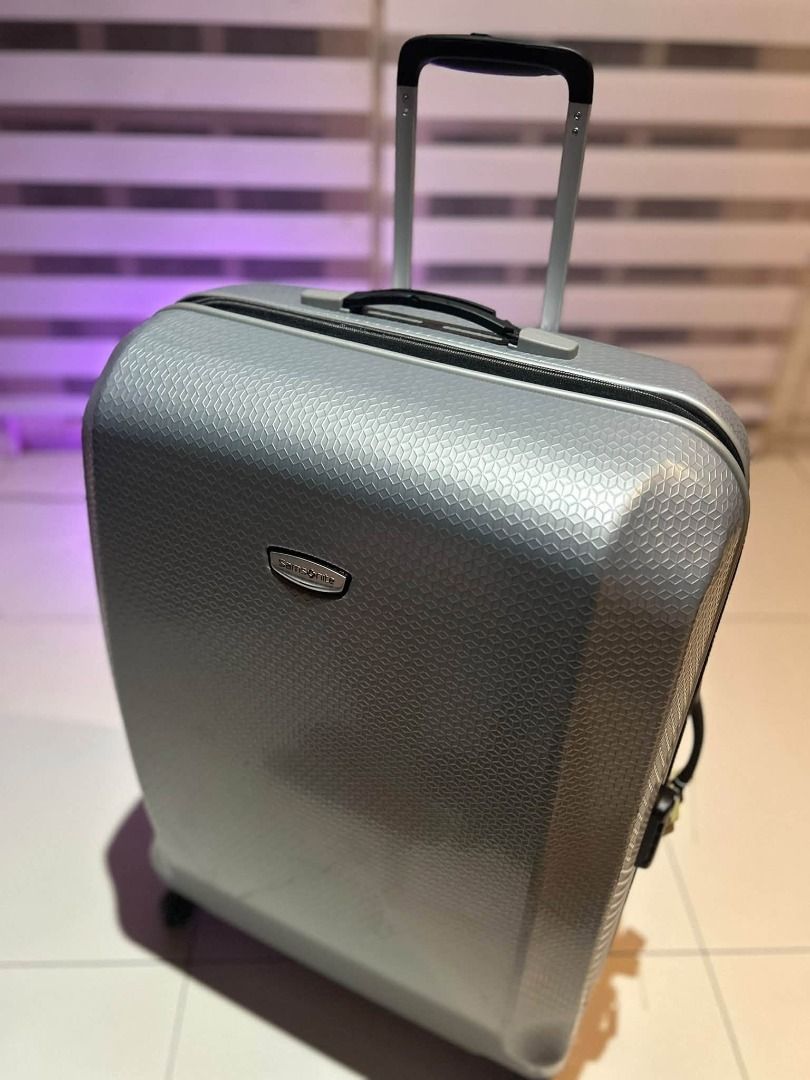 Modern Stylish Samsonite Luggage LARGE 28" silver (Category: Luggage) located in Las Pinas. Submitted by aron.aron (Listing ID 1463025635, Image 2). Description: Authentic JAPAN Model Samsonite Luggage w/ TSA lock Secured invisible zipper tech VG condition -minimal signs of usage. slight flaw see rubber cover part ng top handle, still strong. inside still looks new Dimensions: 28.5" x 19" x 13" Can be pick-up in Las Pinas near City Hall Or Lalamo