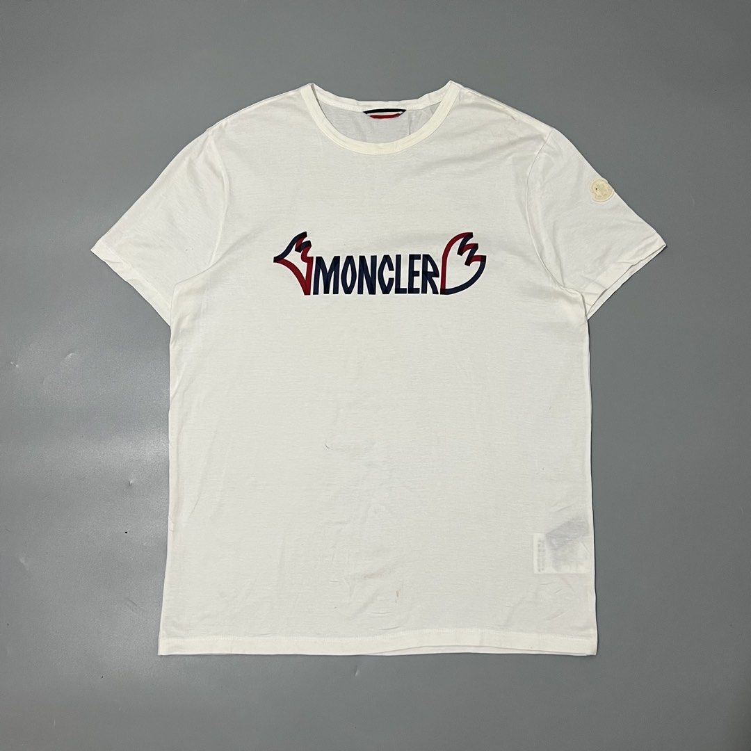 MONCLER - 1952 - T SHIRT (Category: Tshirts & Polo Shirts ) located in Cavite. Submitted by asianluxe (Listing ID 1462963883, Image 1). Description: MONCLER - T SHIRT - 1952 Flat measurements Length:28 inches Width:21 inches Sleeve:8 inches Shoulder to shoulder:17.5 inches Guaranteed authentic Good condition Very presentable Flaw: pin hole & .