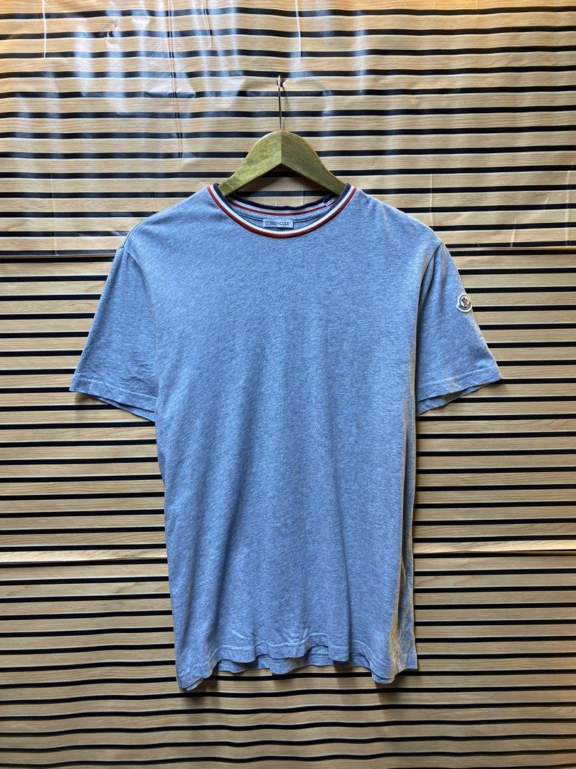 MONCLER “BASIC LOGO “ (Category: Tshirts & Polo Shirts ) located in Makati City. Submitted by drip.poww (Listing ID 1462990412, Image 1). Description: - Authentic Moncler - Color: Gray - Size: Meduim - Dimes: 21x27 - Authentic - Excellent condition - Need wash, fresh from bale - Material: 100% Cotton Please don’t expect too much—these are thrifted (ukay) items. 😊 !!STILL NEGOTIABLE!!.