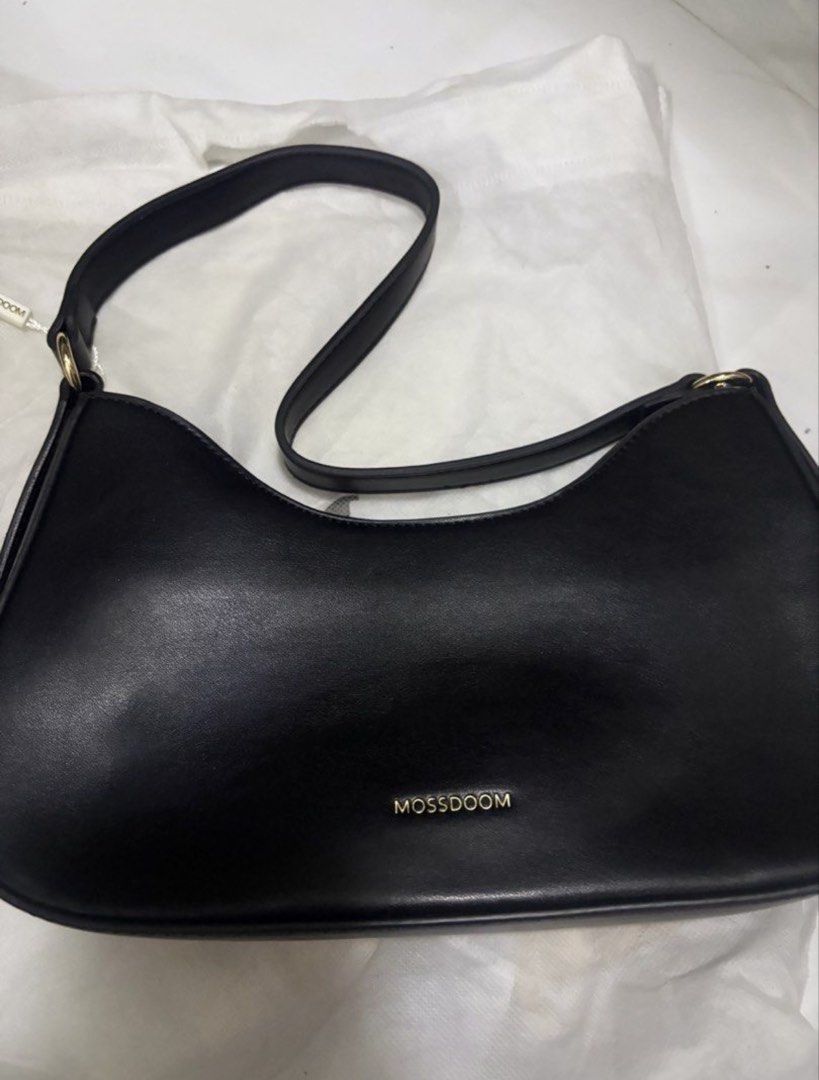 MOSSDOOM BAG (Category: Shoulder Bags) located in Manila. Submitted by alyyy. (Listing ID 1462972203, Image 1). Description: color: black brand new never used w/ dustbag and tag pa rfs: not into this type of bag.