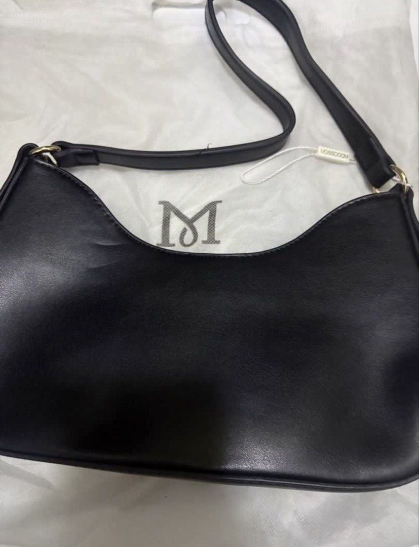 MOSSDOOM BAG (Category: Shoulder Bags) located in Manila. Submitted by alyyy. (Listing ID 1462972203, Image 2). Description: color: black brand new never used w/ dustbag and tag pa rfs: not into this type of bag.