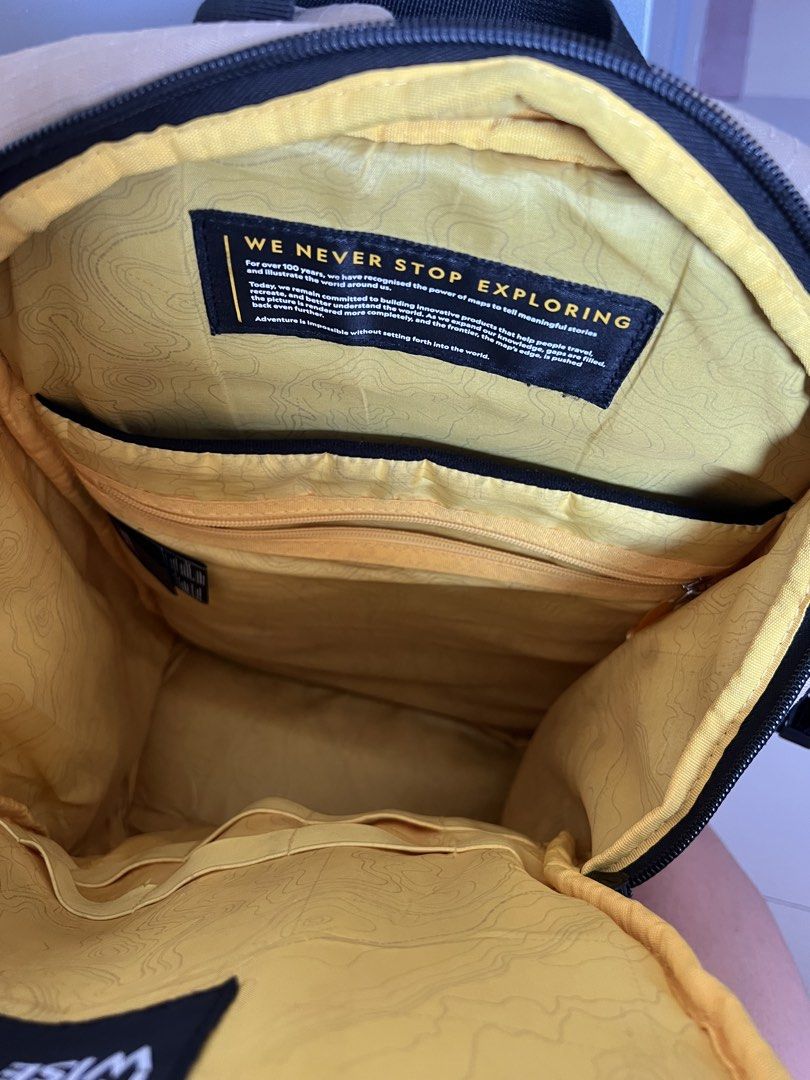 National Geographic Explorer 3 20L Backpack (Category: Backpacks) located in Quezon City. Submitted by declutteringpeppers (Listing ID 1462955013, Image 3). Description: - National Geographic backpack in stylish beige. - Made from sustainable RPET material. - Multiple compartments and pockets for organized storage. - Convenient mesh side pockets. - Unique yellow interior lining with a map print. - Padded back and adjustable straps for maximum com