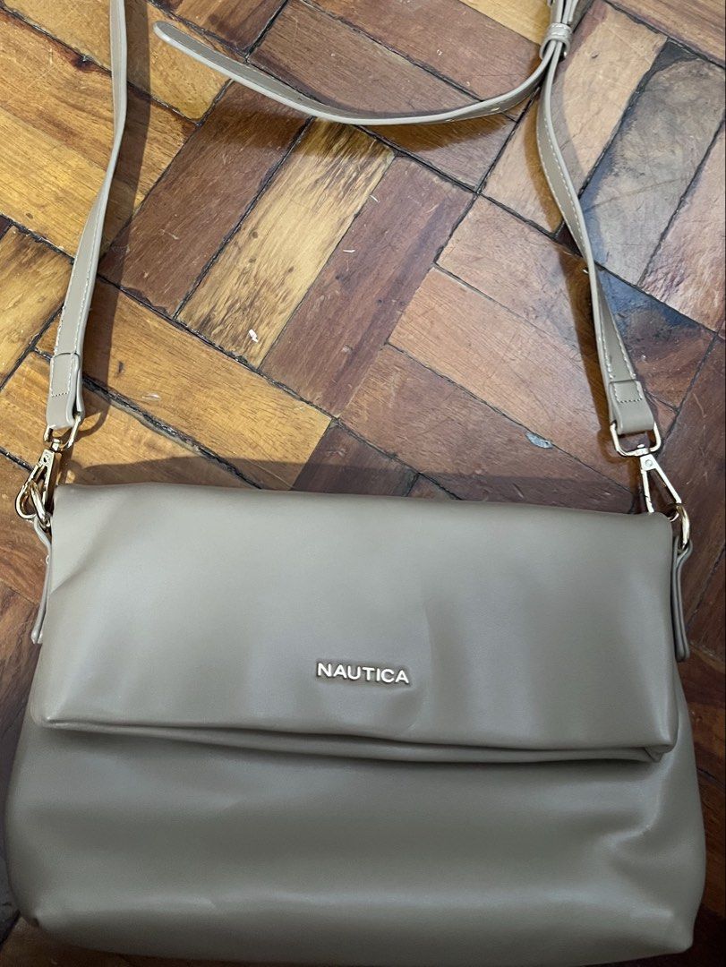 Nautica Almost New (Category: Clutches) located in Mandaluyong City. Submitted by skylistings_c (Listing ID 1462923689, Image 1). Description: 3 months old No issues Good for casual attire With receipt.