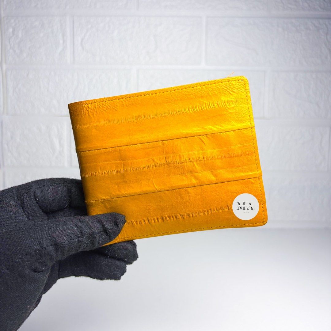 New Eel Medium Bifold Yellow Wallet (Category: Luxury Bags & Wallets) located in Manila. Submitted by maisonavoire (Listing ID 1462890600, Image 1). Description: 𝐍𝐞𝐰 𝐄𝐞𝐥 𝐌𝐞𝐝𝐢𝐮𝐦 𝐁𝐢𝐟𝐨𝐥𝐝 𝐘𝐞𝐥𝐥𝐨𝐰 𝐖𝐚𝐥𝐥𝐞𝐭 𝐌𝐚𝐭𝐞𝐫𝐢𝐚𝐥: Genuine Eel Leather featuring a naturally smooth, fine-grained surface with a distinctive soft texture and subtle natural sheen. Eel leather is known for its lightweight, supple feel and elegant appearanc