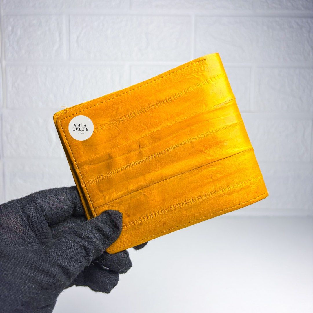 New Eel Medium Bifold Yellow Wallet (Category: Luxury Bags & Wallets) located in Manila. Submitted by maisonavoire (Listing ID 1462890600, Image 2). Description: 𝐍𝐞𝐰 𝐄𝐞𝐥 𝐌𝐞𝐝𝐢𝐮𝐦 𝐁𝐢𝐟𝐨𝐥𝐝 𝐘𝐞𝐥𝐥𝐨𝐰 𝐖𝐚𝐥𝐥𝐞𝐭 𝐌𝐚𝐭𝐞𝐫𝐢𝐚𝐥: Genuine Eel Leather featuring a naturally smooth, fine-grained surface with a distinctive soft texture and subtle natural sheen. Eel leather is known for its lightweight, supple feel and elegant appearanc