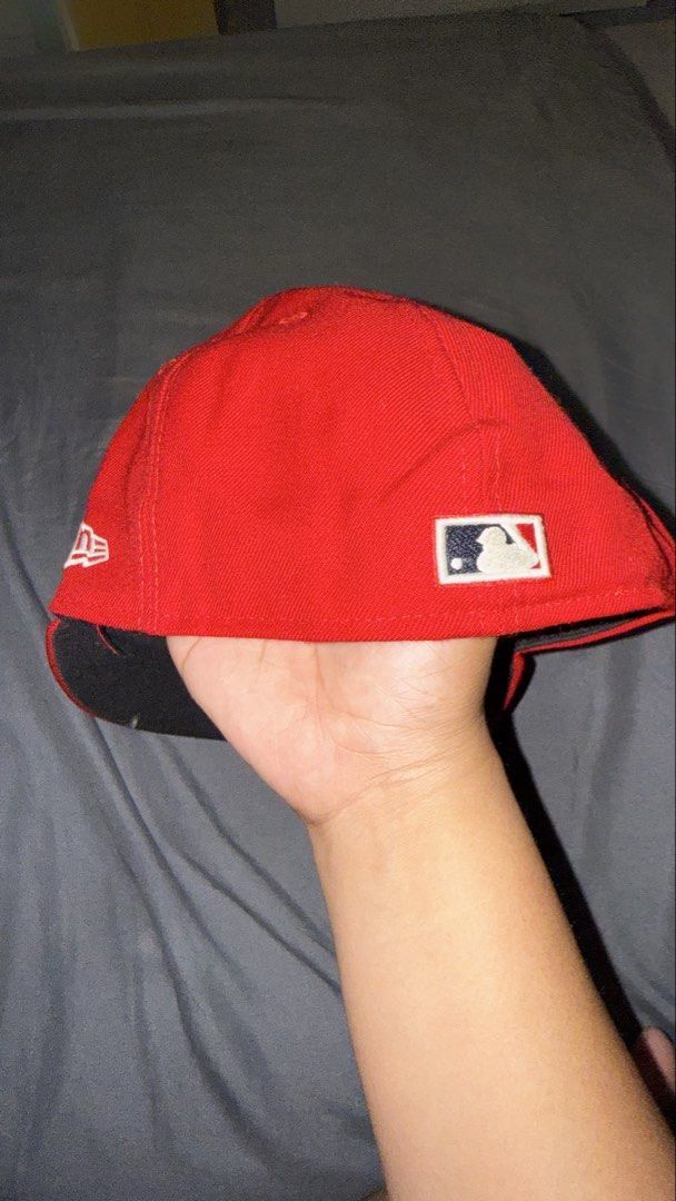 New Era 59FIFTY Cooperstown Red Baseball Cap (Category: Caps & Hats) located in Manila. Submitted by nobleangel (Listing ID 1462921361, Image 2). Description: - Red New Era 59FIFTY Cap - Size: 7 (58.7cm) - Cooperstown Collection logo inside - MLB logo on the back - Minor marks on the brim - Ideal for baseball enthusiasts.