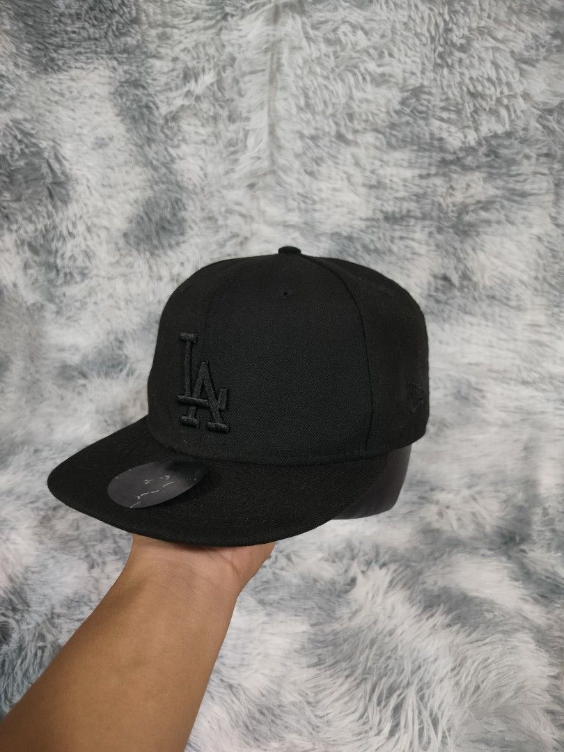 New Era LA Triple Black (Category: Caps & Hats) located in Midsayap. Submitted by rogeandrei29987 (Listing ID 1462995135, Image 2). Description: 📌LA Triple Black by New Era • 7 ¼ on tag •9.5/10 cr •Washed and ready to wear✅ •No issue •As New MOP: Gcash Courier✈️: J&T Unli vouch/Vc with item Loc: Kabacan, North Cotabato/Parang Maguindanao❤️.