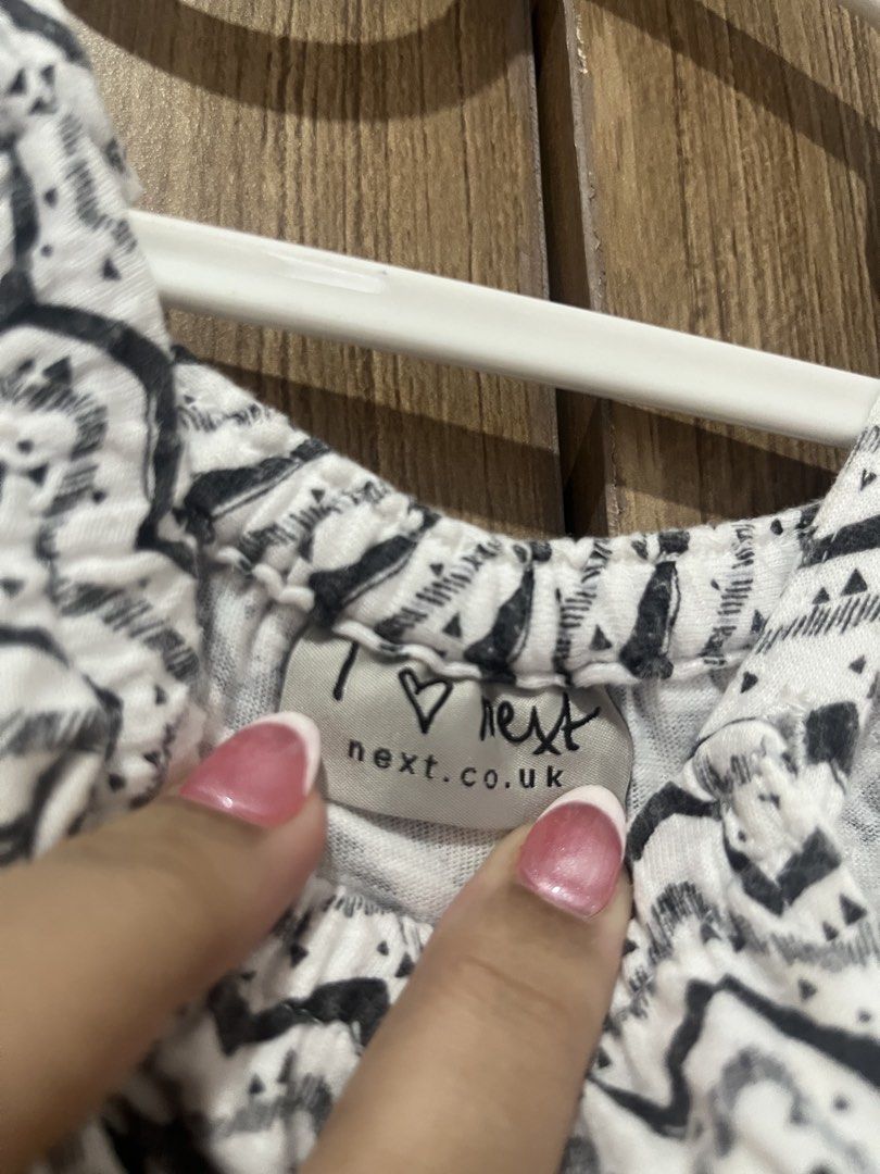 Next Black and White Zigzag Jumpsuit (Category: Babies & Kids Fashion) located in Pasig City. Submitted by stormyera19 (Listing ID 1463019139, Image 2). Description: - Cute black and white zigzag print jumpsuit. 2nd owner - Elasticated chest for a comfy fit - Side pockets for convenience - Ideal for casual wear - Easy to put on - Best fits 2-3 years old 📌 Condition & Details: Pre-loved unless stated as Brand New. Condition rating is based on per