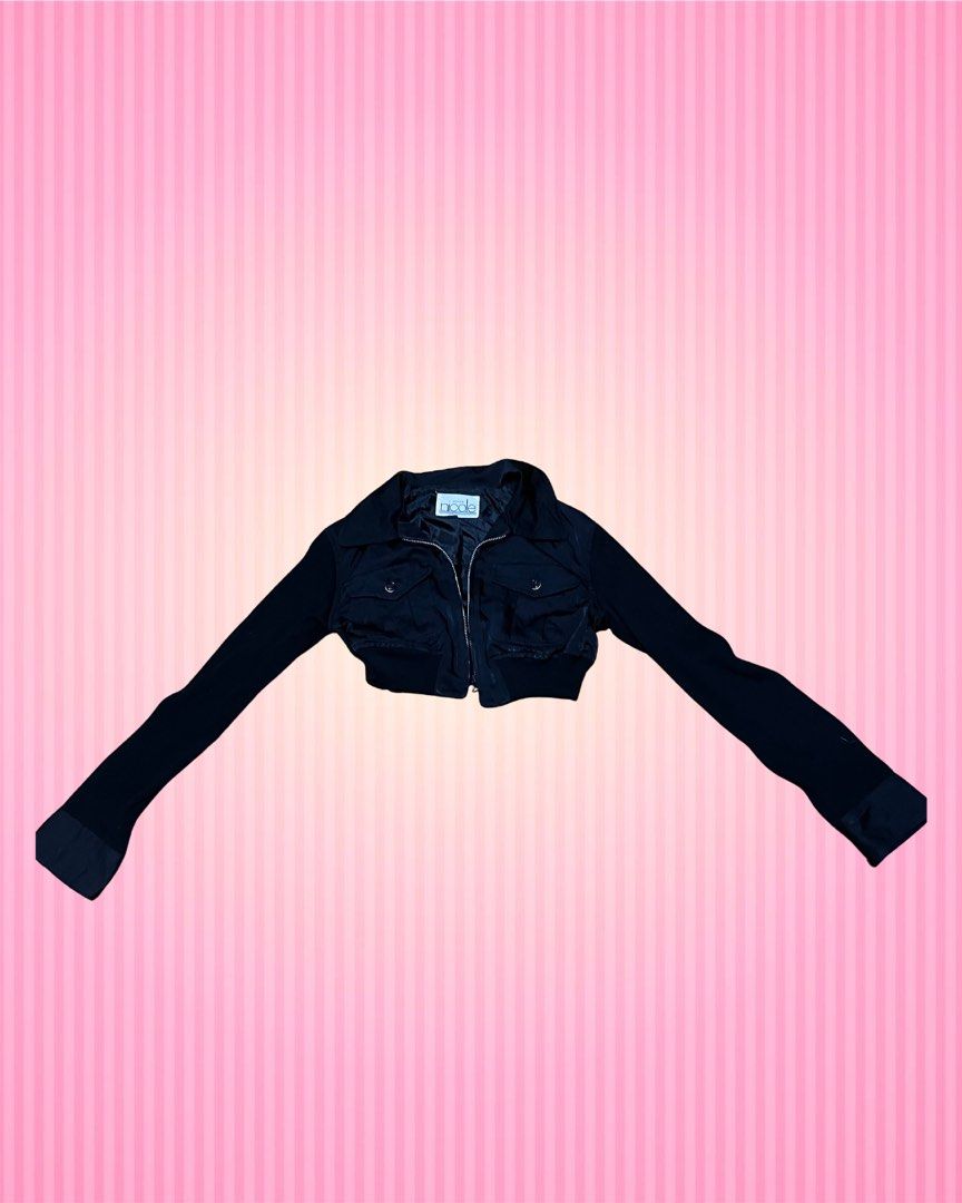 Nicole Black Cropped Jacket (Category: Coats, Jackets and Outerwear) located in Bulacan. Submitted by faithcloset (Listing ID 1463034597, Image 1). Description: - Brand: Nicole - Style: Cropped Jacket - Color: Black - Sleeves: Long - Closure: Zip-up front - Pockets: Two buttoned chest pockets - Features: Elasticated hem and cuffs - Styling: Great for layering over tops.