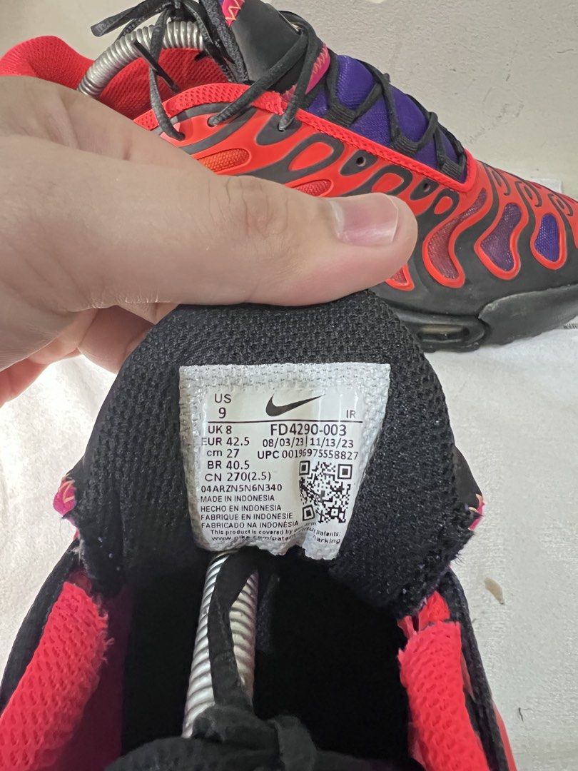 Nike Air Max Plus Drift All Day FD4290-003 (Category: Sneakers) located in Binan City. Submitted by huntwear_.turtle (Listing ID 1462992775, Image 2). Description: - Nike Air Max Plus Drift sneakers - Size: US 9 (UK 8, EUR 42.5) - Color: Black with striking red and purple flame-like accents - Ideal for everyday wear.