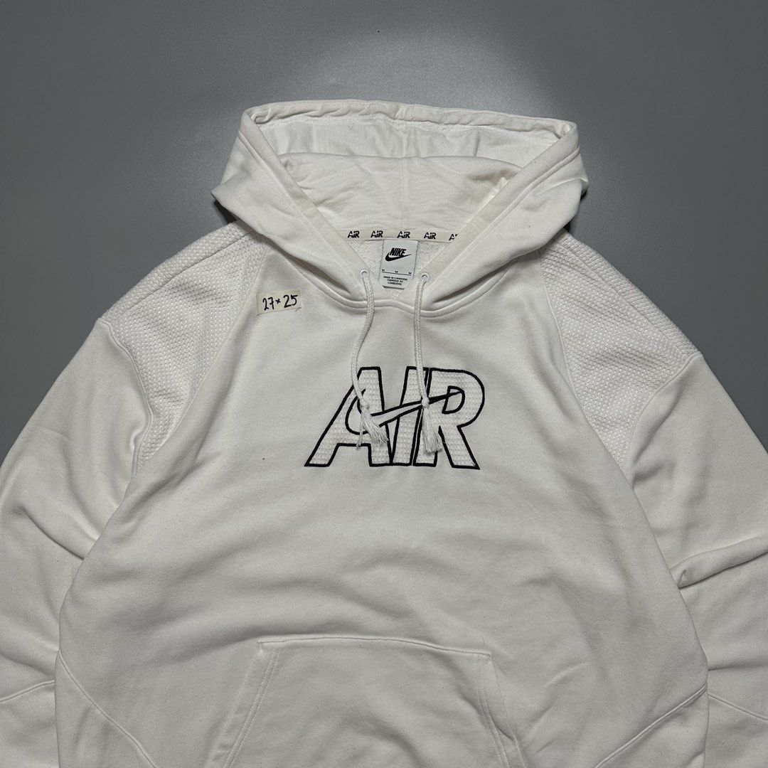 Nike Air White Hoodie Jacket (Category: Coats, Jackets and Outerwear) located in Baguio. Submitted by subaitems (Listing ID 1462901376, Image 2). Description: - White Nike Air hoodie - Features a large 'AIR' graphic on the front - Nike Air logo detail on the sleeve cuff - Comfortable and stylish design - Ideal for casual wear.