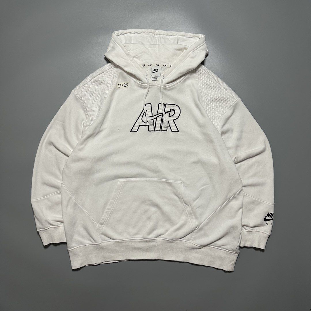Nike Air White Hoodie Jacket (Category: Coats, Jackets and Outerwear) located in Baguio. Submitted by subaitems (Listing ID 1462901376, Image 1). Description: - White Nike Air hoodie - Features a large 'AIR' graphic on the front - Nike Air logo detail on the sleeve cuff - Comfortable and stylish design - Ideal for casual wear.