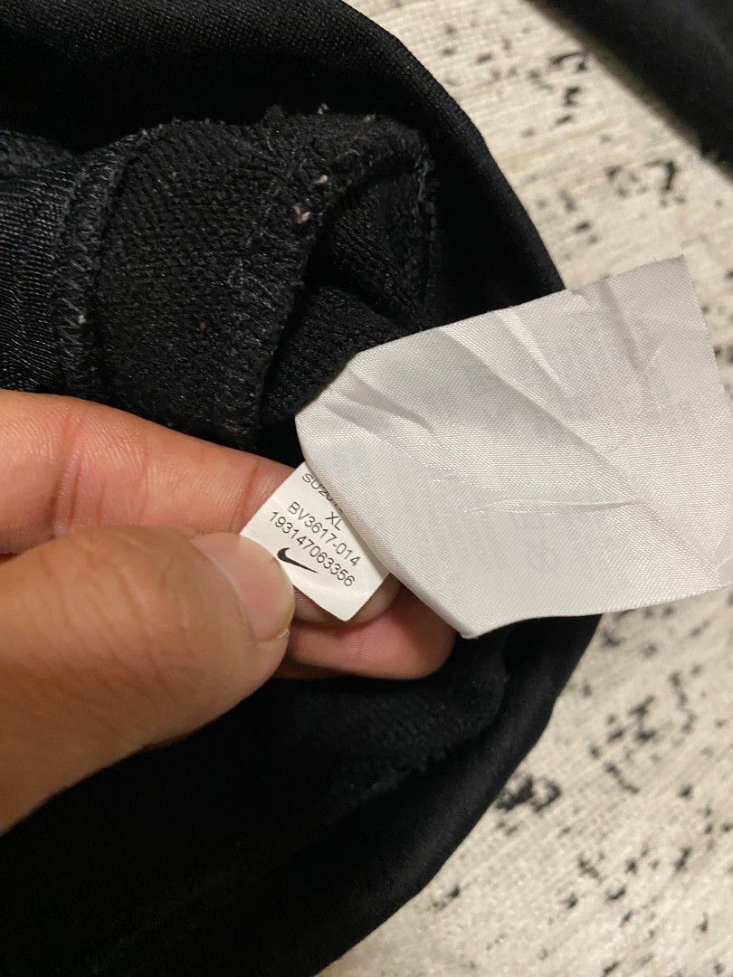 Nike Black Full Zip Track Jacket (Category: Coats, Jackets and Outerwear) located in Pandi. Submitted by nitrogenbomb-999 (Listing ID 1463076345, Image 3). Description: - Black Nike track jacket - Full zip closure - Front pockets - Size: 19x24 ( XL on tag) - Ideal for casual wear or sports.