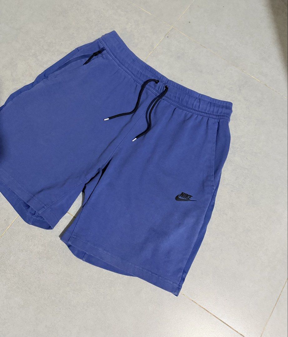 Nike Blue Jersey Shorts Size S (Category: Shorts) located in Caloocan City. Submitted by jamesantho62588 (Listing ID 1462968337, Image 2). Description: - Brand: Nike - Color: Blue - Material: Cotton - Waist: Elastic with drawstring - Pockets: Side pockets, one with zipper - Logo: Nike logo on left leg - Size: S - Origin: Made in Cambodia.