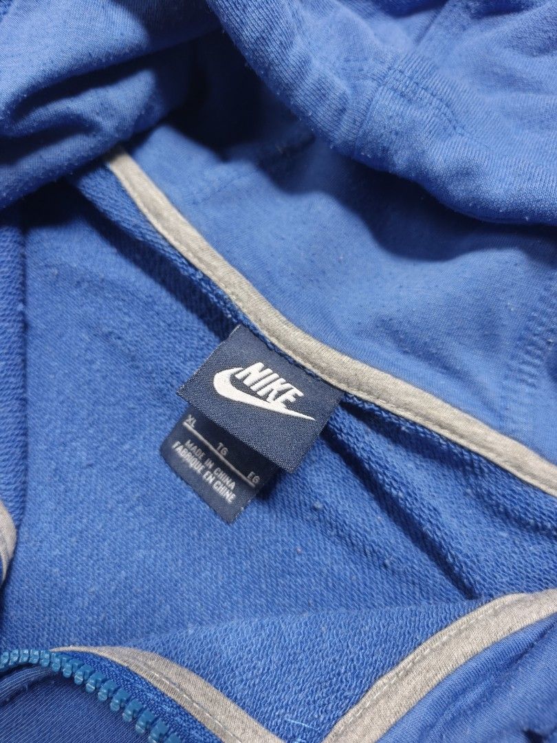 Nike Blue Zip-Up Hoodie (Category: Coats, Jackets and Outerwear) located in Manila. Submitted by yuzthrift (Listing ID 1463005223, Image 3). Description: Y2K NIKE EMBROID LOGO RED FULL ZIP HOODIE JACKET AUTHENTIC ‎ ‎SIZE : XL ‎DIME : 23 X 27.5 ‎9.5/10 COLORATE ‎ISSUE : LINTS ONLY ‎ ‎400PHP + SHIPPING.