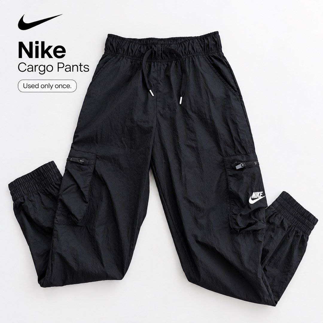 Nike Cargo Pants Black (Category: Joggers) located in Bacolor. Submitted by jslpnd (Listing ID 1462894245, Image 1). Description: - Black Nike cargo pants - FYR: I'm 5ft height, goods yung fit sa'kin 👌 - Elastic waistband with drawstring - Multiple zippered pockets .
