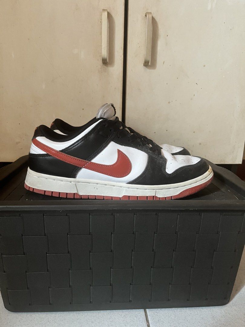 Nike Dunk Low Black White Red (Category: Sneakers) located in Manila. Submitted by keanuchedi94156 (Listing ID 1462973188, Image 2). Description: - Classic Nike Dunks - Colorway: Black, White, and Red - Silhouette: Low-top - Condition: Pre-owned, with plenty of life left - Features: Black laces, soles show some dirt - Ideal for: Casual wear.