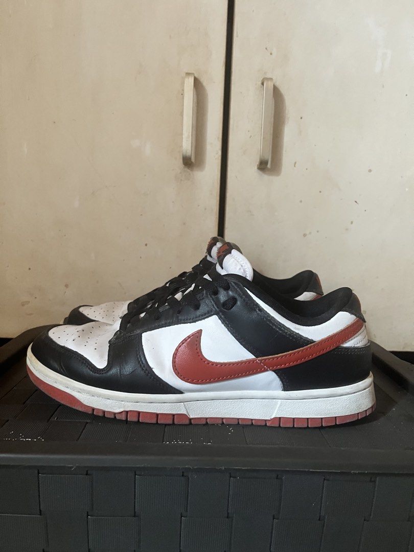 Nike Dunk Low Black White Red (Category: Sneakers) located in Manila. Submitted by keanuchedi94156 (Listing ID 1462973188, Image 1). Description: - Classic Nike Dunks - Colorway: Black, White, and Red - Silhouette: Low-top - Condition: Pre-owned, with plenty of life left - Features: Black laces, soles show some dirt - Ideal for: Casual wear.