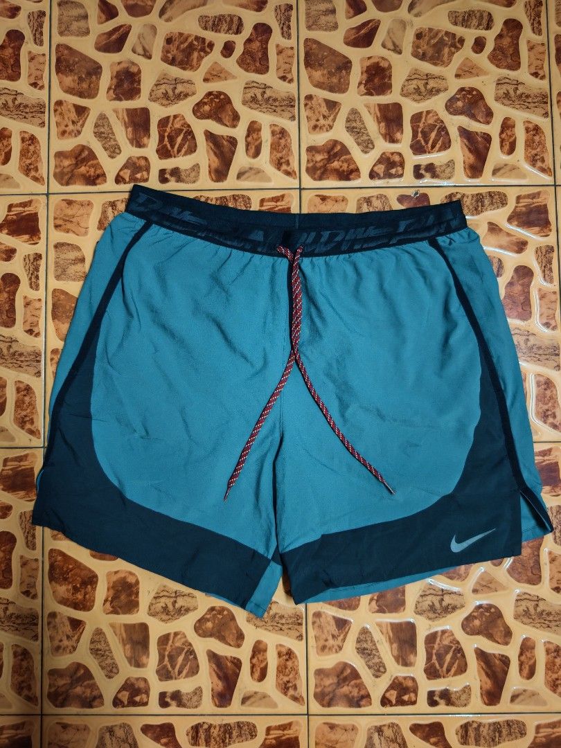 Nike Flex (Category: Activewear) located in Santa Cruz. Submitted by ukayhuntworldwide (Listing ID 1462896629, Image 1). Description: Nike Flex Stride Wild Run Short Good as new condition Xl on tag Dimes 30-36 waistline 15.5 length Dm sa interested.