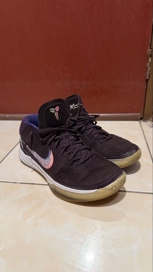 Nike Kobe AD (Category: Sneakers) located in Manila. Submitted by sneakspxxks (Listing ID 1463028441, Image 1). Description: - Nike Kobe Mamba Focus basketball shoes - Color: Dark purple with pink and blue accents on the swoosh - Size: US 12 (UK 11, EUR 46, CM 30) - Manufactured: 11/28/17 - Condition: Some signs of wear on soles and uppers - Ideal for: Basketball or casual wear.