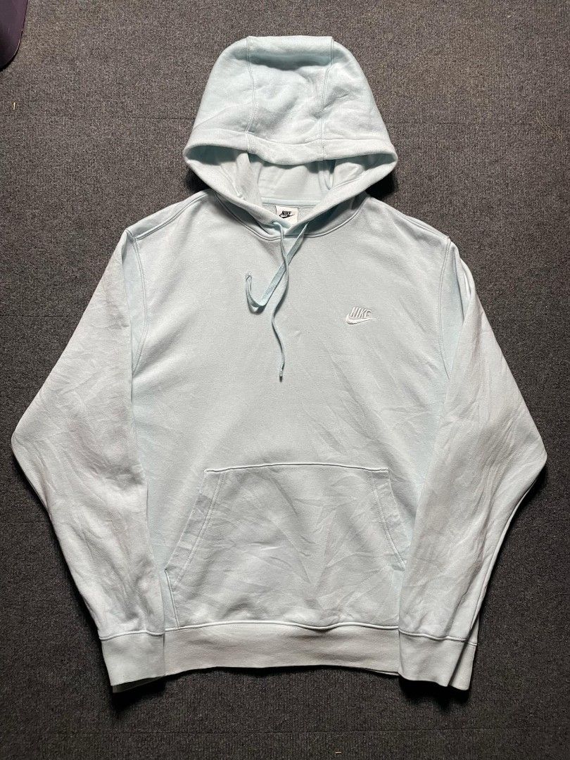 Nike Light Blue Pullover Hoodie Size L (Category: Coats, Jackets and Outerwear) located in Ligao. Submitted by merjudioma64633 (Listing ID 1463010509, Image 1). Description: - Light blue Nike hoodie - Size L - Made in Sri Lanka - Front pocket - Drawstring hood - Small embroidered Nike logo on chest - Comfortable and casual - Perfect for everyday wear.