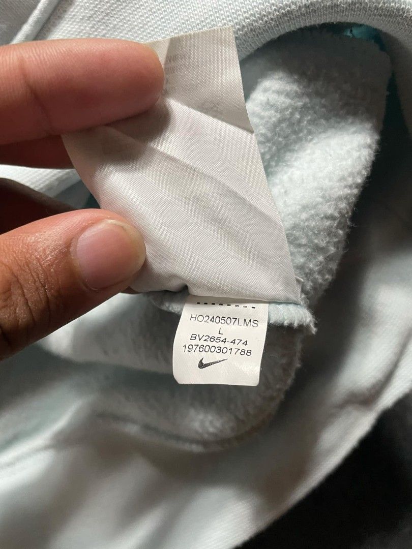 Nike Light Blue Pullover Hoodie Size L (Category: Coats, Jackets and Outerwear) located in Ligao. Submitted by merjudioma64633 (Listing ID 1463010509, Image 3). Description: - Light blue Nike hoodie - Size L - Made in Sri Lanka - Front pocket - Drawstring hood - Small embroidered Nike logo on chest - Comfortable and casual - Perfect for everyday wear.