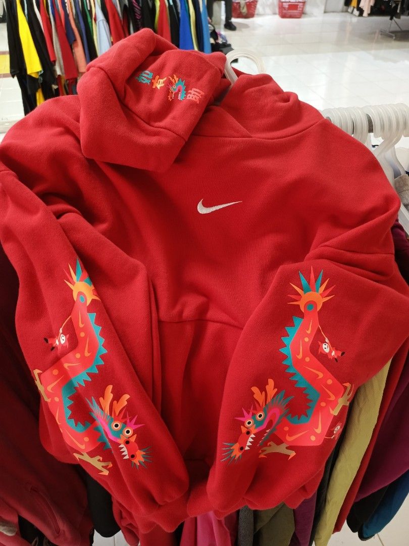 Nike Red Dragon Hoodie Size L (Category: Hoodies) located in Cabatuan. Submitted by penthegreat (Listing ID 1463112261, Image 2). Description: - Red Nike Hoodie - Size: L - Dragon graphics on sleeves - Small Nike logo on chest - Made in China - Ideal for casual wear.