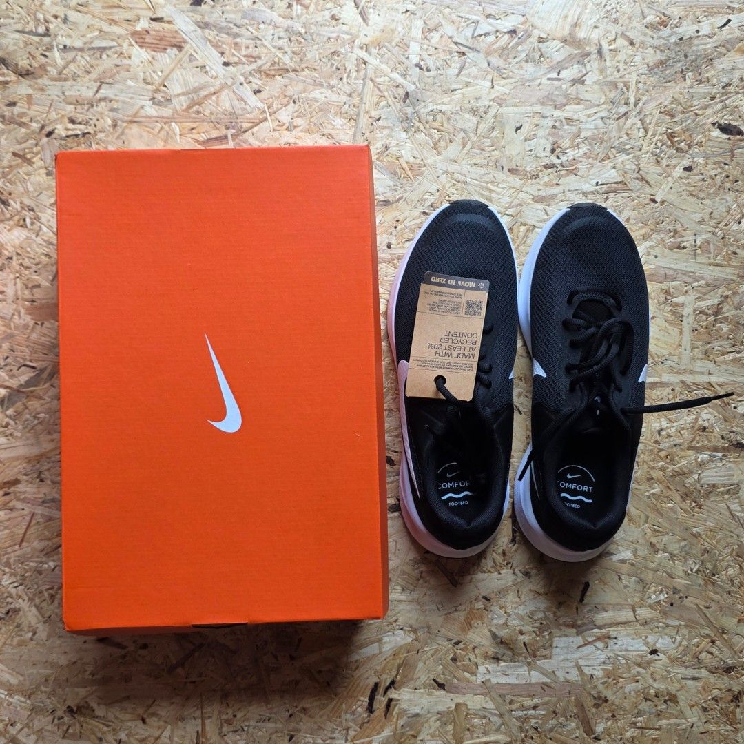 Nike Revolution 7 Men's Running Shoes (Category: Sneakers) located in Pasay City. Submitted by xsamskie (Listing ID 1462909694, Image 1). Description: - Nike Revolution 6 NN running shoes - Color: Black with white accents - Size: 9.5 - Features at least 20% recycled content - Comes with original box.