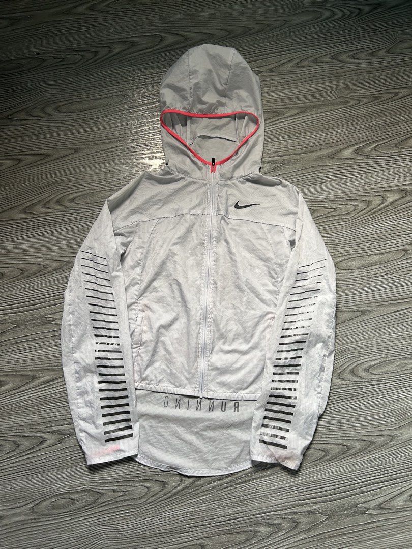 Nike Running Lightweight Hooded Jacket Grey (Category: Coats, Jackets and Outerwear) located in Dasmarinas. Submitted by zn_upcldtrs (Listing ID 1462995364, Image 2). Description: NIKE IMPOSSIBLY LIGHT RUNNING JACKET - 16 W / 18 L - LIGHTWEIGHT - AS NEW CONDITION - NO MAJOR FLAWS 📩 .