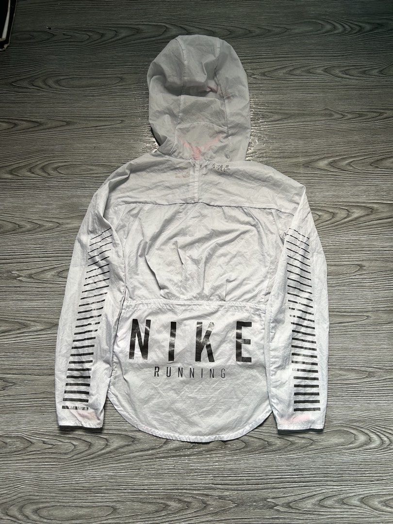 Nike Running Lightweight Hooded Jacket Grey (Category: Coats, Jackets and Outerwear) located in Dasmarinas. Submitted by zn_upcldtrs (Listing ID 1462995364, Image 3). Description: NIKE IMPOSSIBLY LIGHT RUNNING JACKET - 16 W / 18 L - LIGHTWEIGHT - AS NEW CONDITION - NO MAJOR FLAWS 📩 .