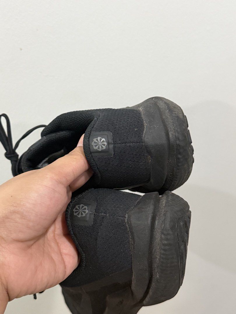 Nike Running Shoes Black (Category: Wedges) located in Makati City. Submitted by ariannelaz54133 (Listing ID 1462928375, Image 2). Description: - Black Nike running shoes - Ideal for everyday runs or training - Comfortable and lightweight design - Shows some signs of wear on soles and toe box - Plenty of life remaining for your workouts.