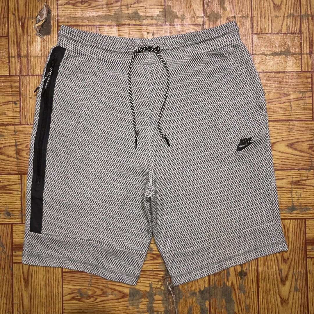 Nike Tech fleece printed short (Category: Shorts) located in Dasmarinas. Submitted by corenyxmessy_3rd_account (Listing ID 1463070080, Image 1). Description: waist - 32 to 34 length - 21.5.