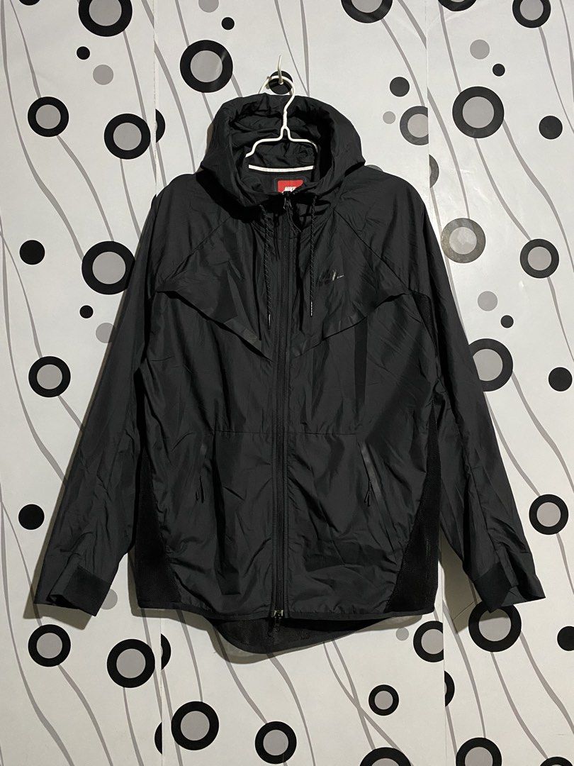 NIKE Tech Hypermesh Windrunner Jacket (Category: Coats, Jackets and Outerwear) located in Cebu City. Submitted by patspickph (Listing ID 1463033887, Image 1). Description: This is a NIKE Tech Hypermesh Windrunner Jacket for men. **Type: Men's lightweight windbreaker / nylon jacket.Color: Black (-010 is Nike's color code for solid black). **Materials: Outer shell is 100% Nylon, while the inner lining features a 100% Polyester hypermesh design for 