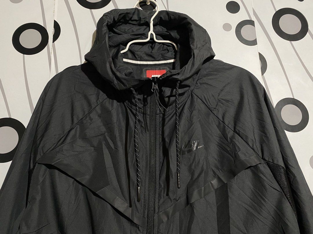 NIKE Tech Hypermesh Windrunner Jacket (Category: Coats, Jackets and Outerwear) located in Cebu City. Submitted by patspickph (Listing ID 1463033887, Image 3). Description: This is a NIKE Tech Hypermesh Windrunner Jacket for men. **Type: Men's lightweight windbreaker / nylon jacket.Color: Black (-010 is Nike's color code for solid black). **Materials: Outer shell is 100% Nylon, while the inner lining features a 100% Polyester hypermesh design for 