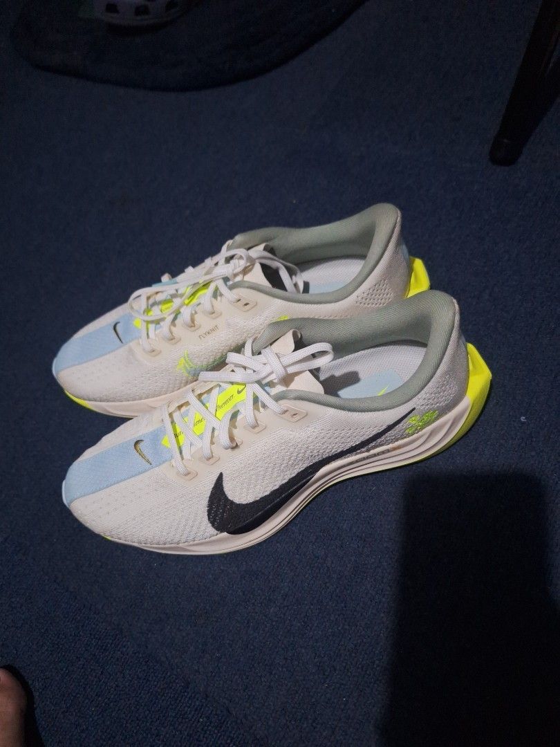 Nike ZoomX Running Shoes (Category: Casual Shoes) located in Manila. Submitted by adolphreyes645 (Listing ID 1463003388, Image 3). Description: - White and neon yellow Nike ZoomX running shoes - Features a breathable Flyknit upper - Ideal for running and training sessions - Experience lightweight and responsive cushioning - Get them now!.