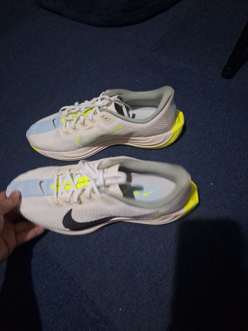 Nike ZoomX Running Shoes (Category: Casual Shoes) located in Manila. Submitted by adolphreyes645 (Listing ID 1463003388, Image 2). Description: - White and neon yellow Nike ZoomX running shoes - Features a breathable Flyknit upper - Ideal for running and training sessions - Experience lightweight and responsive cushioning - Get them now!.