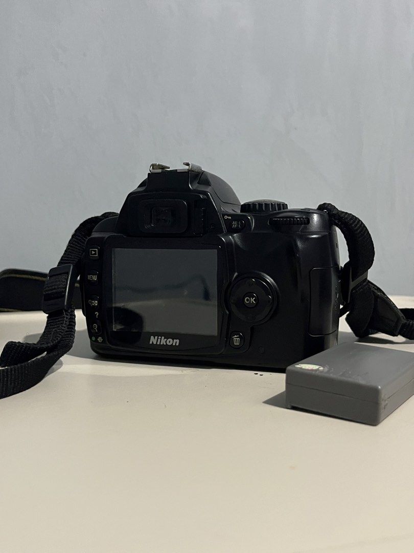 Nikon D70 (Category: Cameras) located in Manila. Submitted by milamartina123 (Listing ID 1462979724, Image 2). Description: not tested, bloated battery selling it as is | for parts tondo, manila loc no return/refund once settled.
