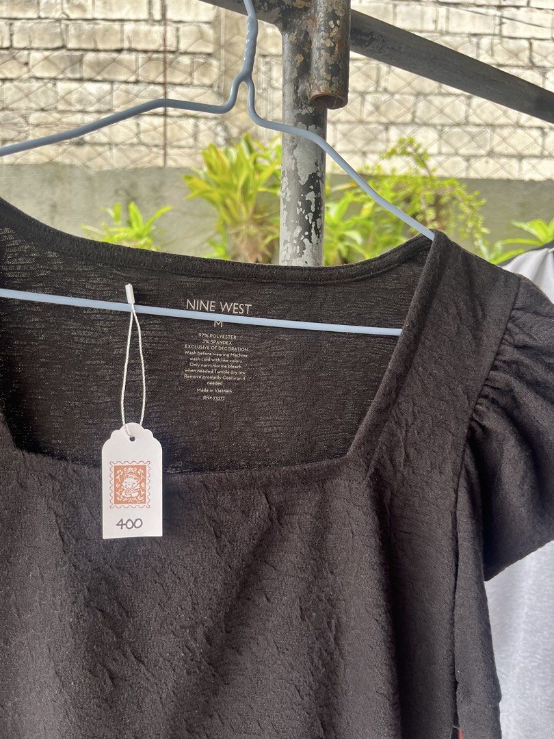 Nine West Black Square Neck Puff Sleeve Top (Category: Blouses) located in Dinalupihan. Submitted by penaflorcj (Listing ID 1462916030, Image 3). Description: - Black Nine West top (Also available in rust) - Size: Medium (M) - Square neckline - Puff sleeves - Textured fabric all over - Versatile: dress up or down - Easy to pair with jeans or skirts - Comfortable and stylish rfs: decluttering *sale price + discount when you buy more than 2 items.